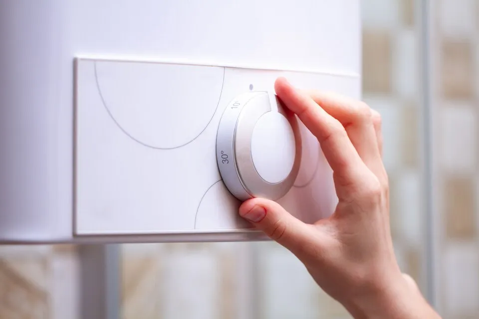Hand adjusting boiler temperature