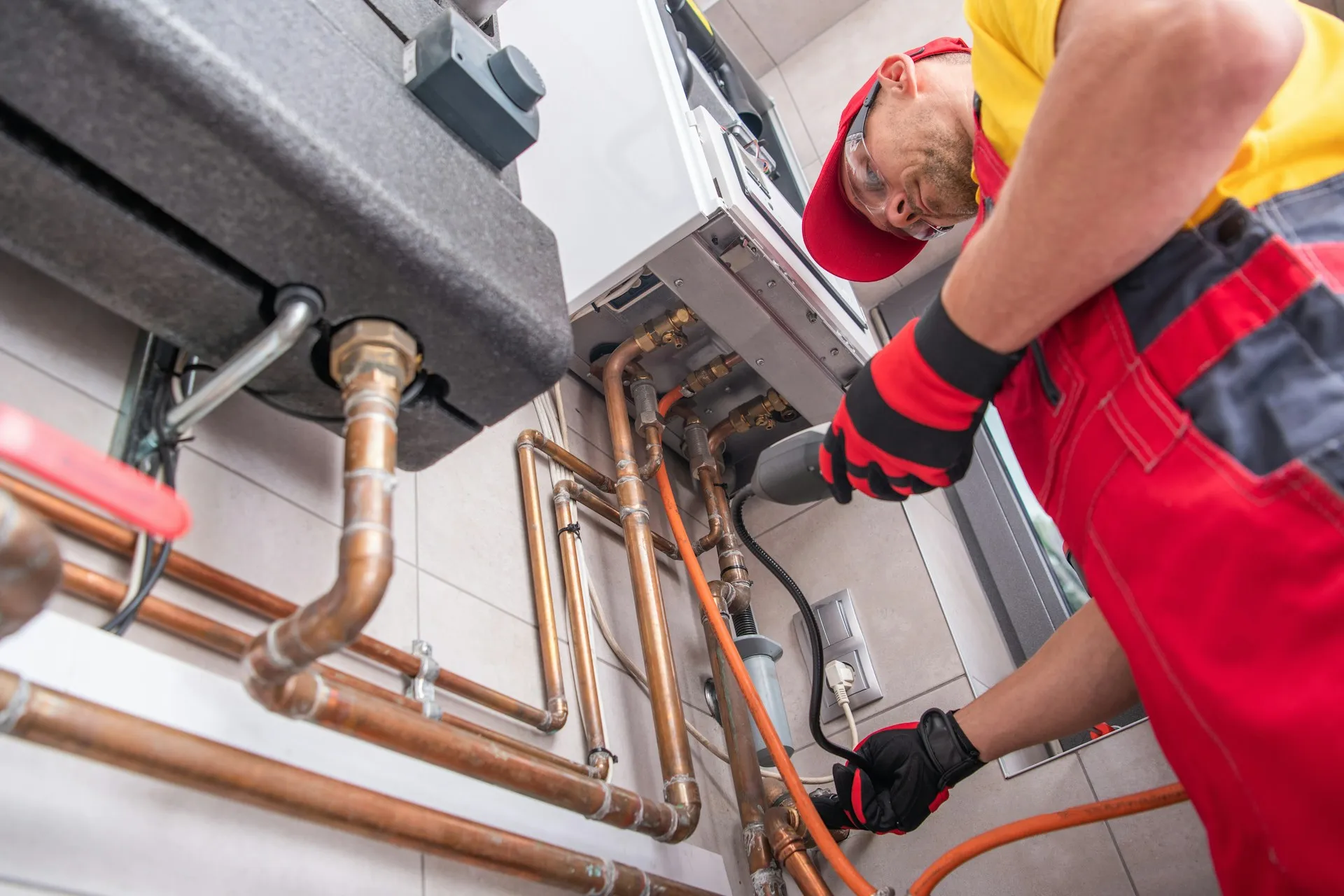 Man repairing a central heating system.