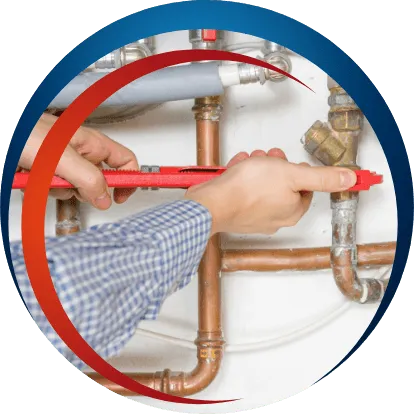 Man plumbing copper pipes.