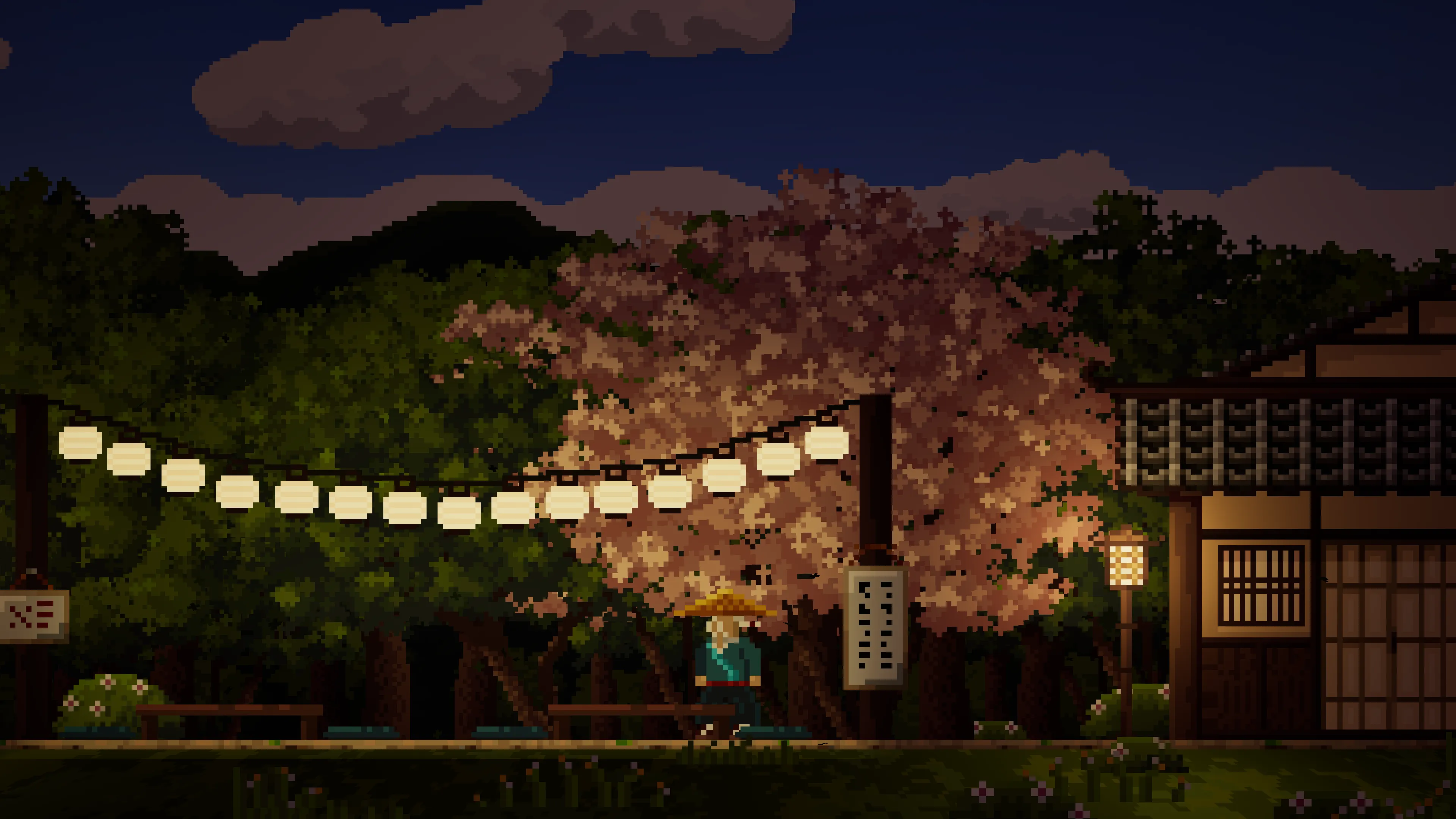 The same plaza at night lit by paper lanterns