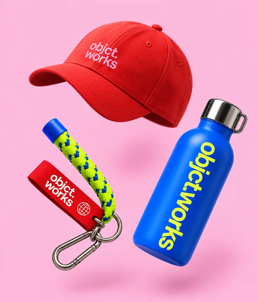 Branded red cap, lanyard and blue bottle