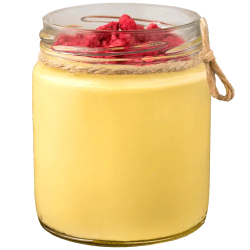 Mousse de Mango 100% vegetal (vegano) con textura aireada y topping de frambuesa en tarro individual.