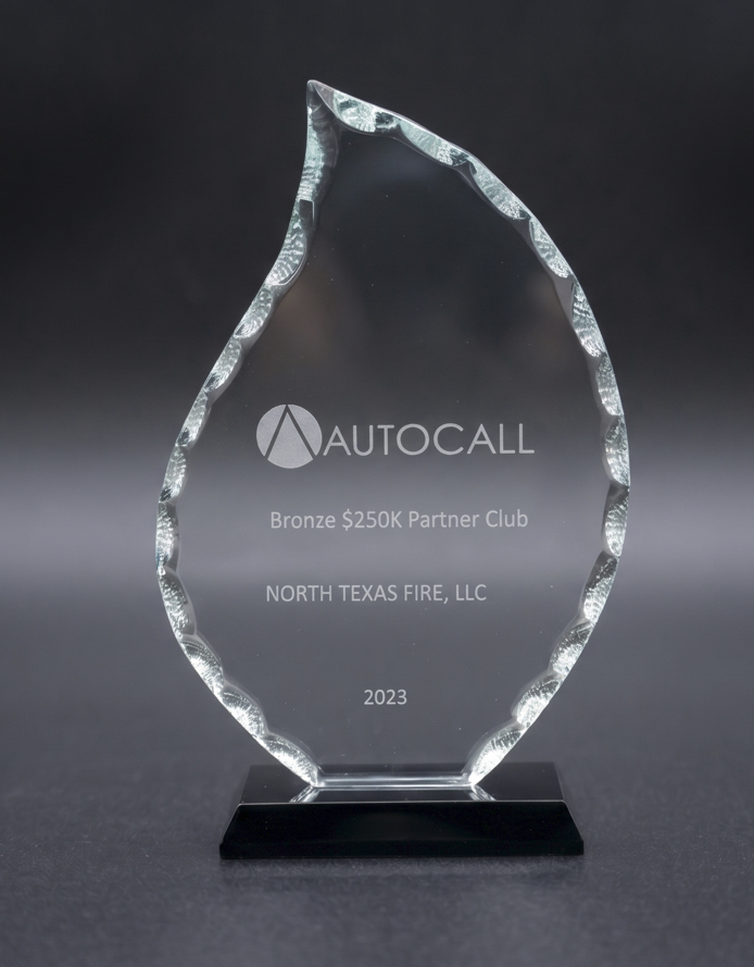 Autocall glass award for Bronze $250K Partner Club given to North Texas Fire, LLC, dated 2023.