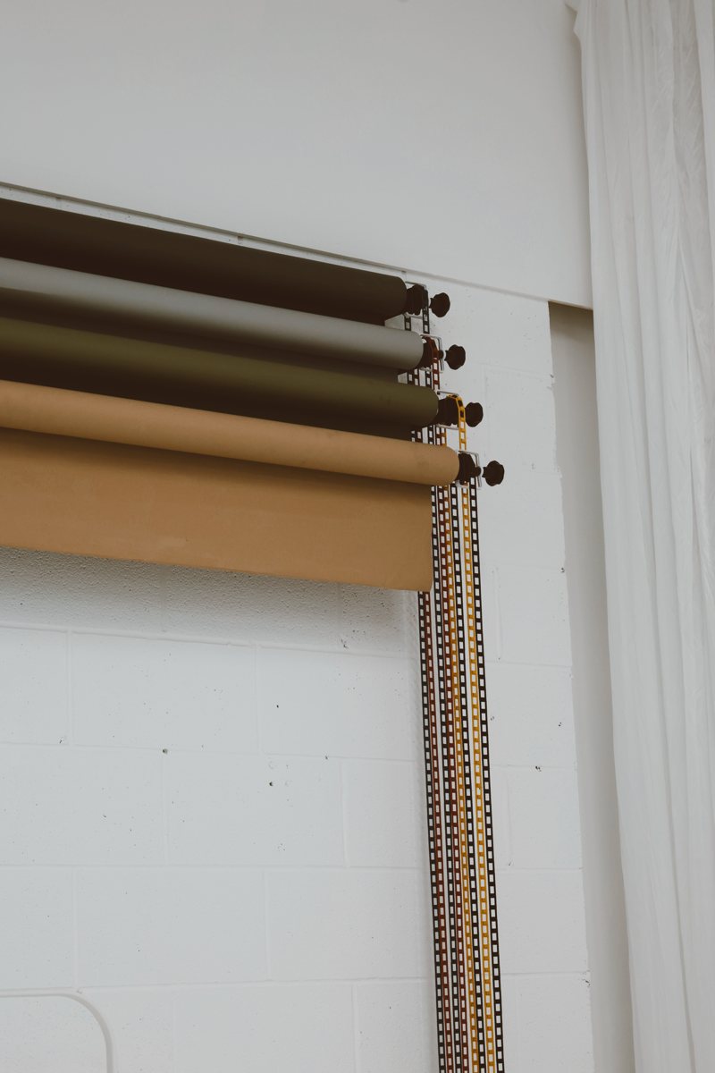 Wall-mounted paper backdrop rolls