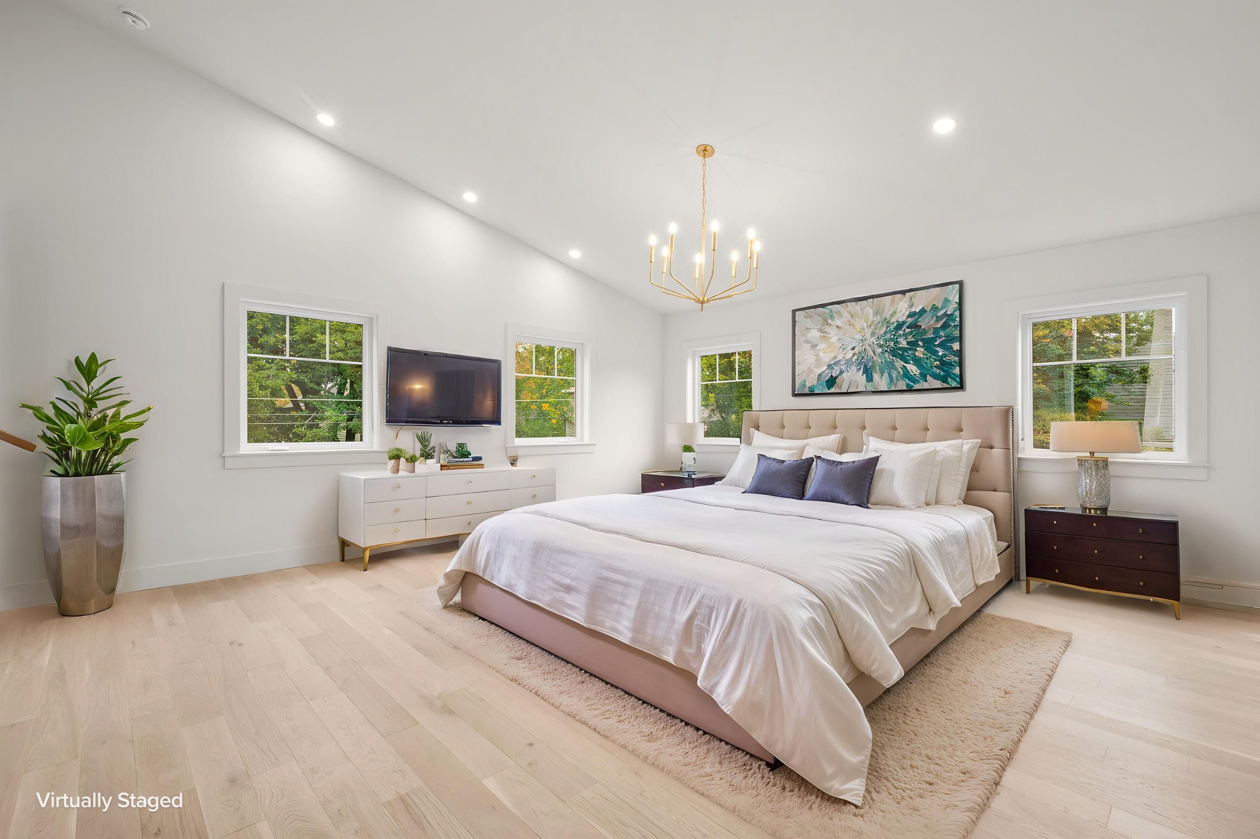 Primary bedroom after virtual staging by Newlife Studio