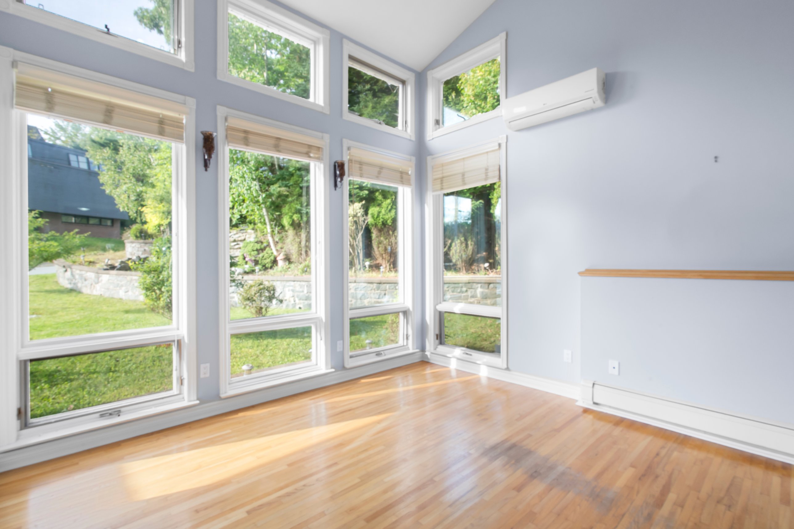 Empty sunroom before virtual staging