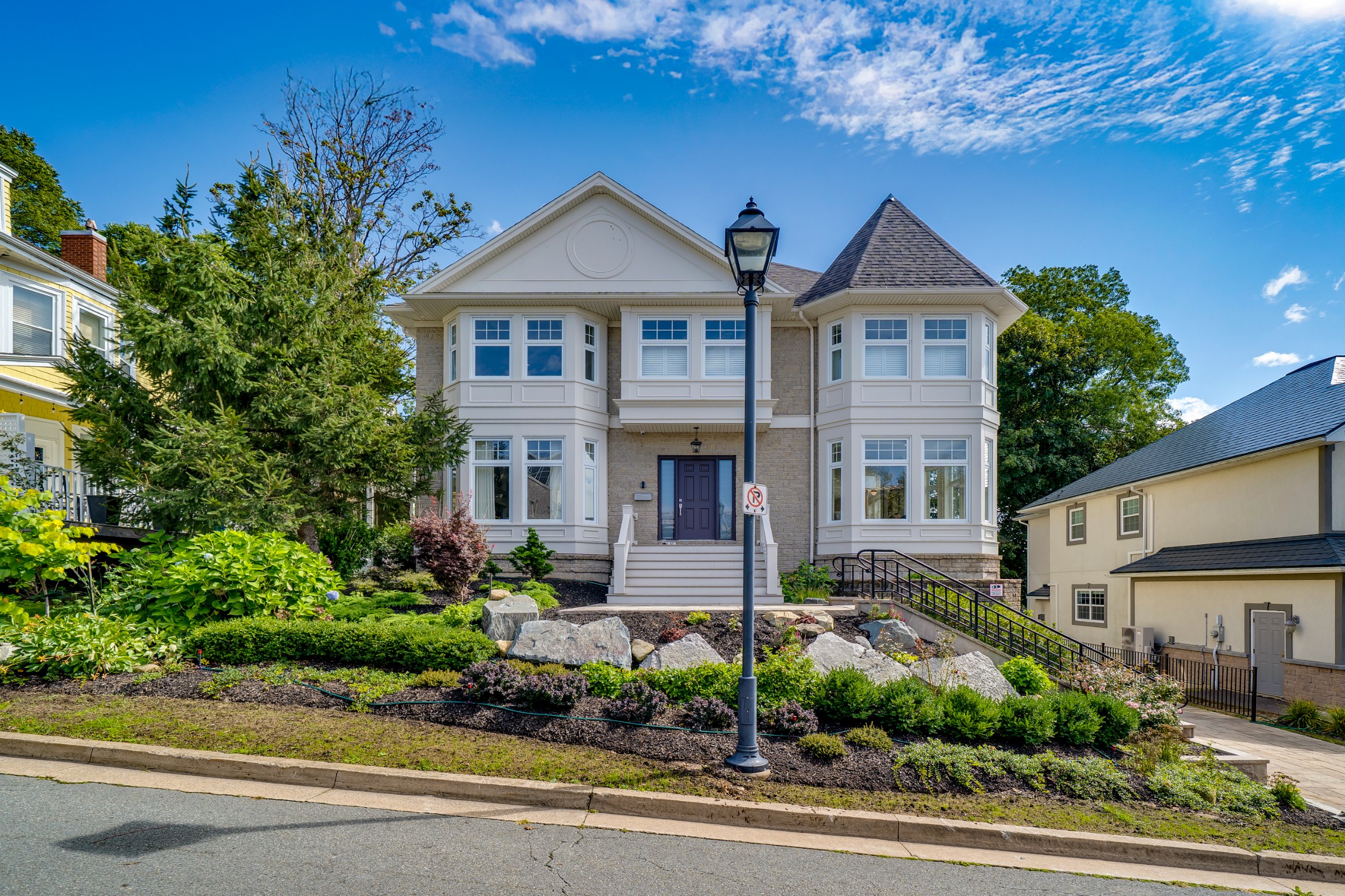 Original daytime photo of a Halifax home before AI twilight transformation