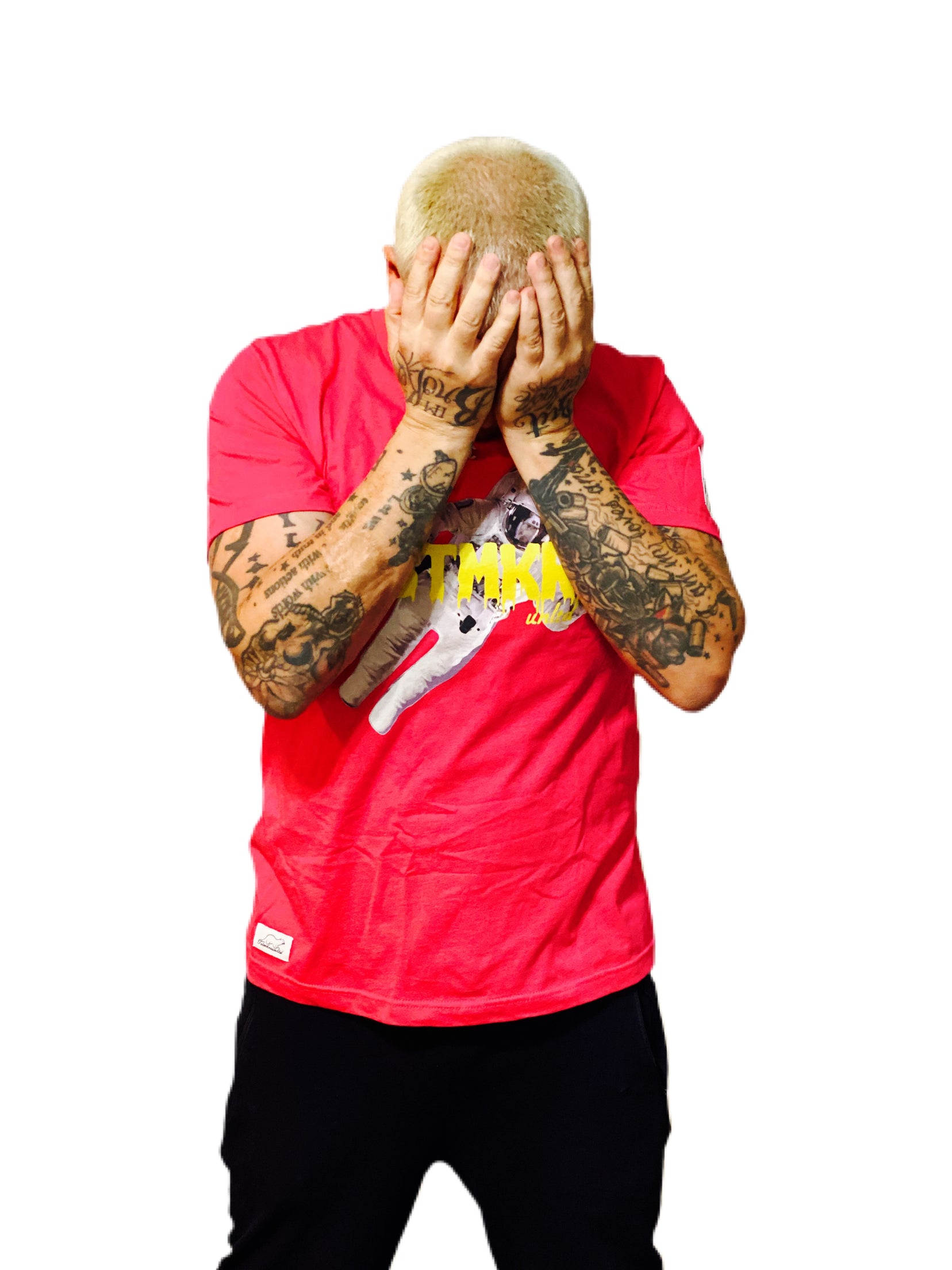 Blond model covering face in pink TSTMKRSunltd graphic tee