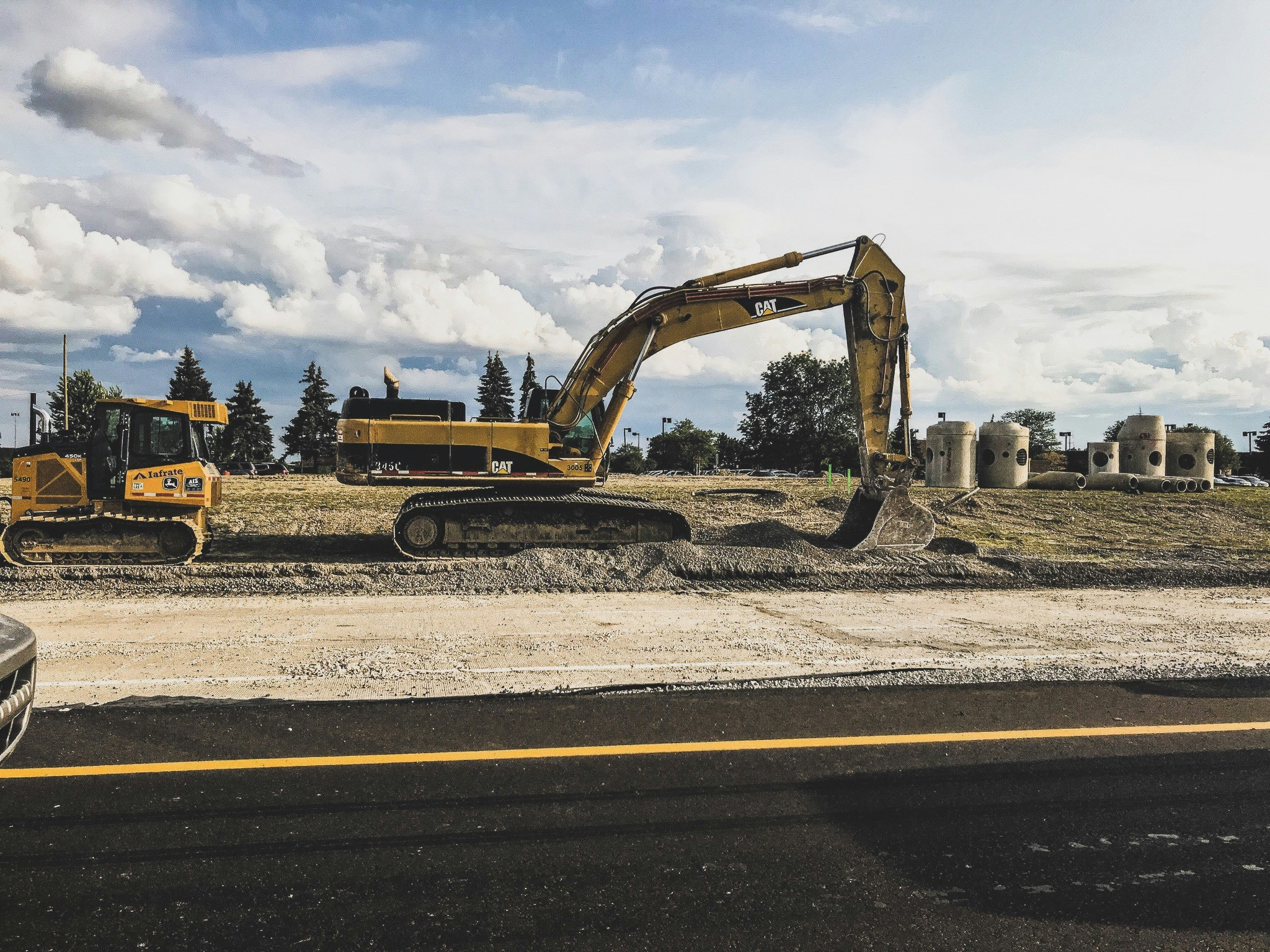 Yellow Caterpillar excavator at work