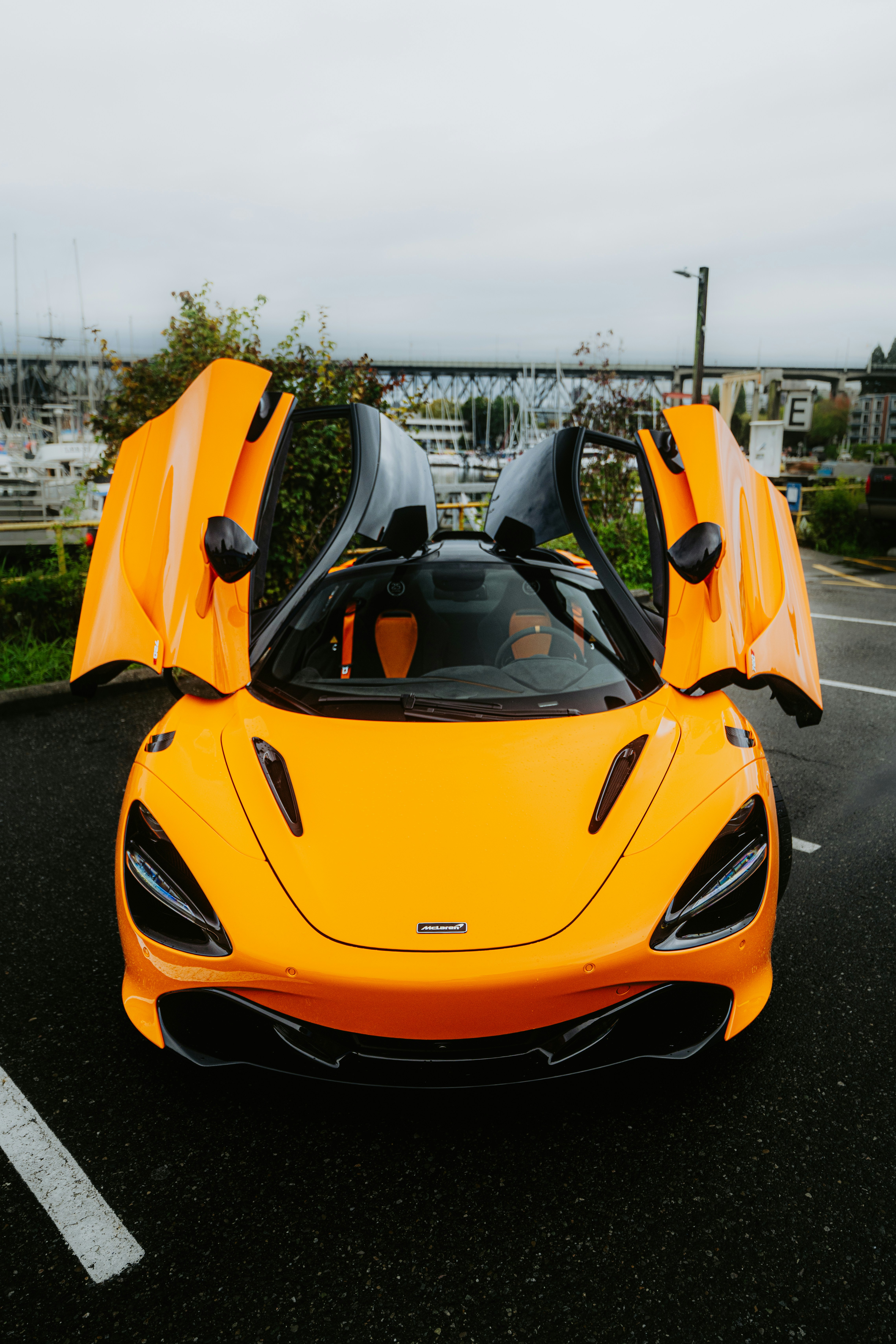 Papaya-orange McLaren with doors open