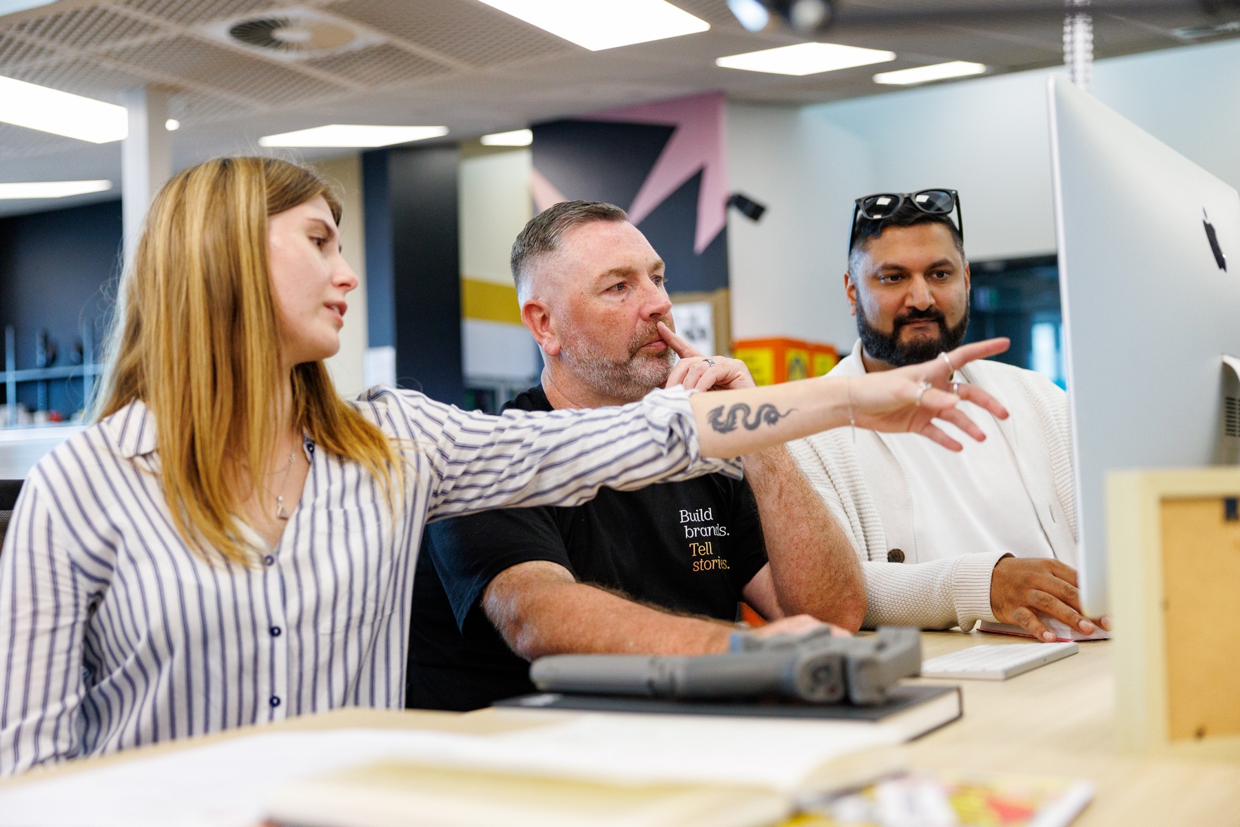 The nim creative team working through a brand together