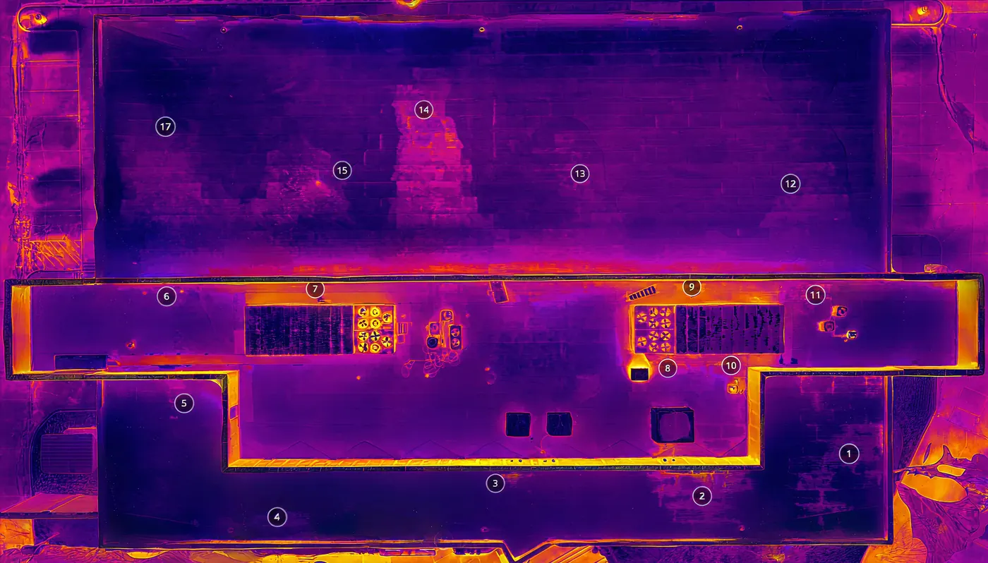 The same roof in thermal imaging, with numbered zones marking temperature anomalies
