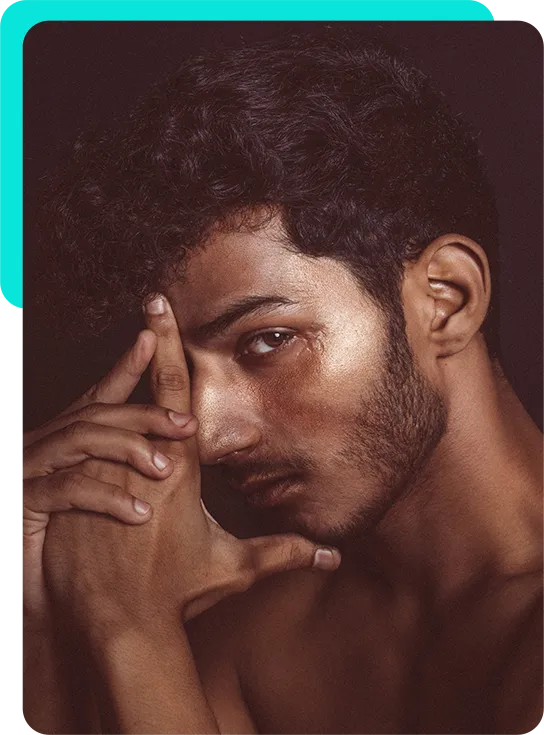 Man deep in thought, hand to his face