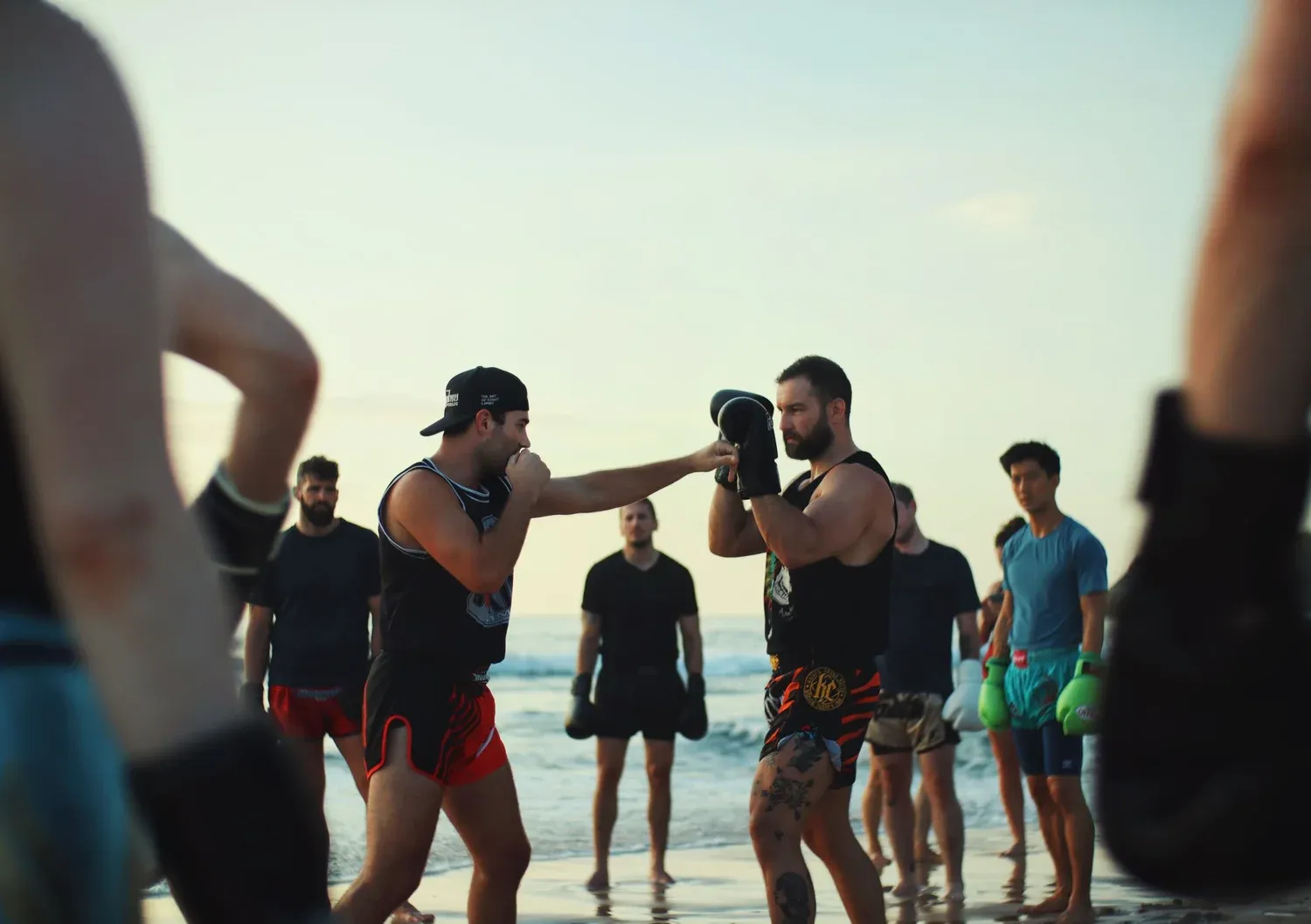 Muay Thai pad work on the beach at Playa Guiones