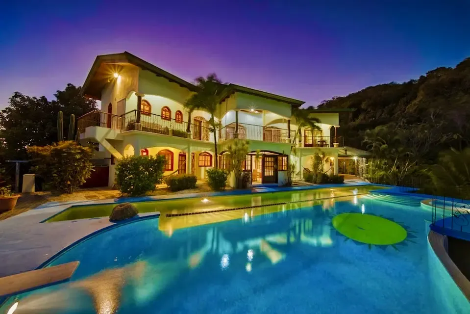 The villa and pool at Jungle's Edge at dusk, Nosara, Costa Rica