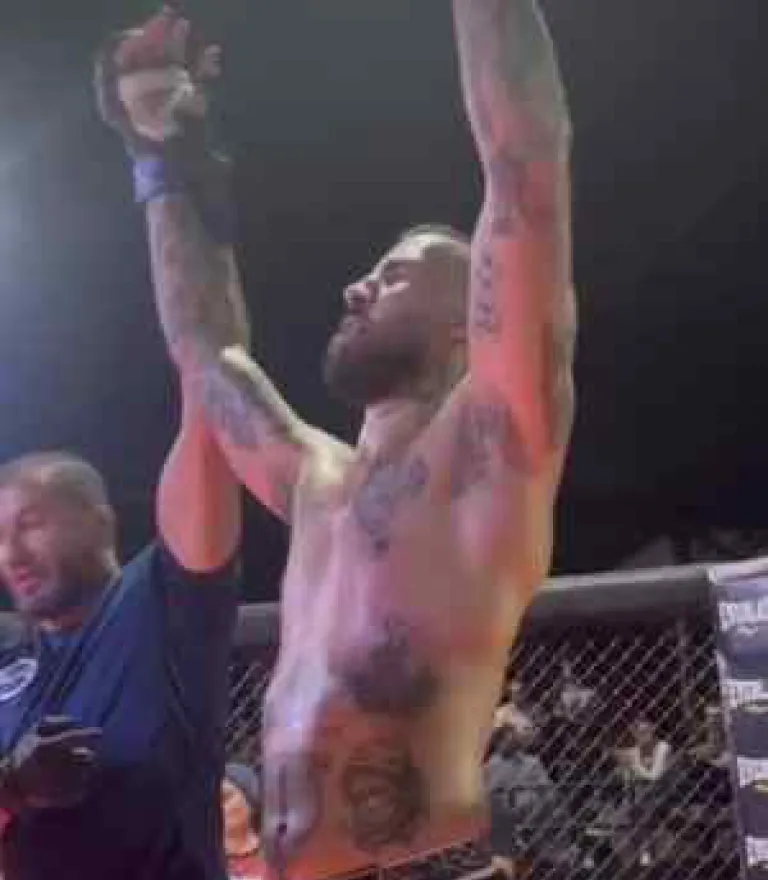Cachi celebrating a win in the cage