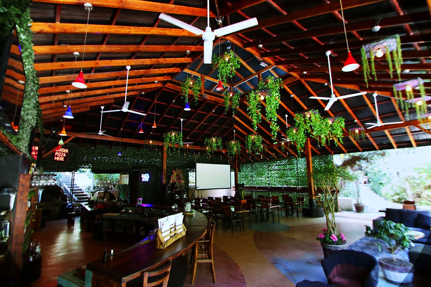 The open-air rancho bar and dining hall at Jungle's Edge