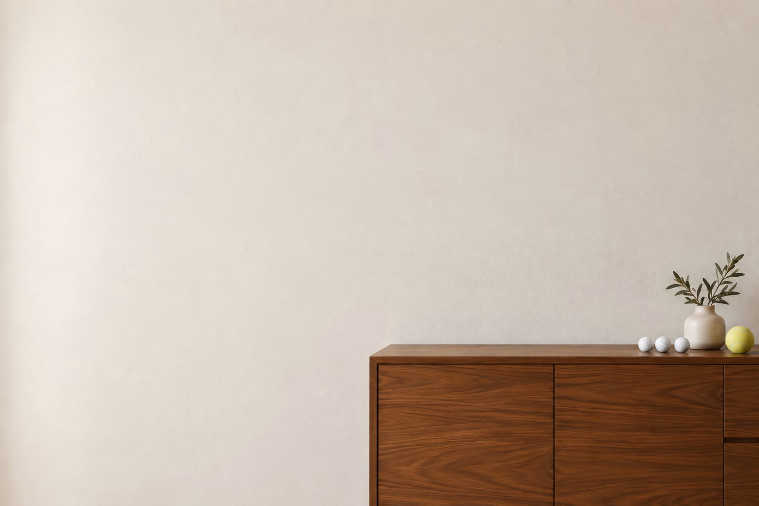 Living room wall above a wooden credenza