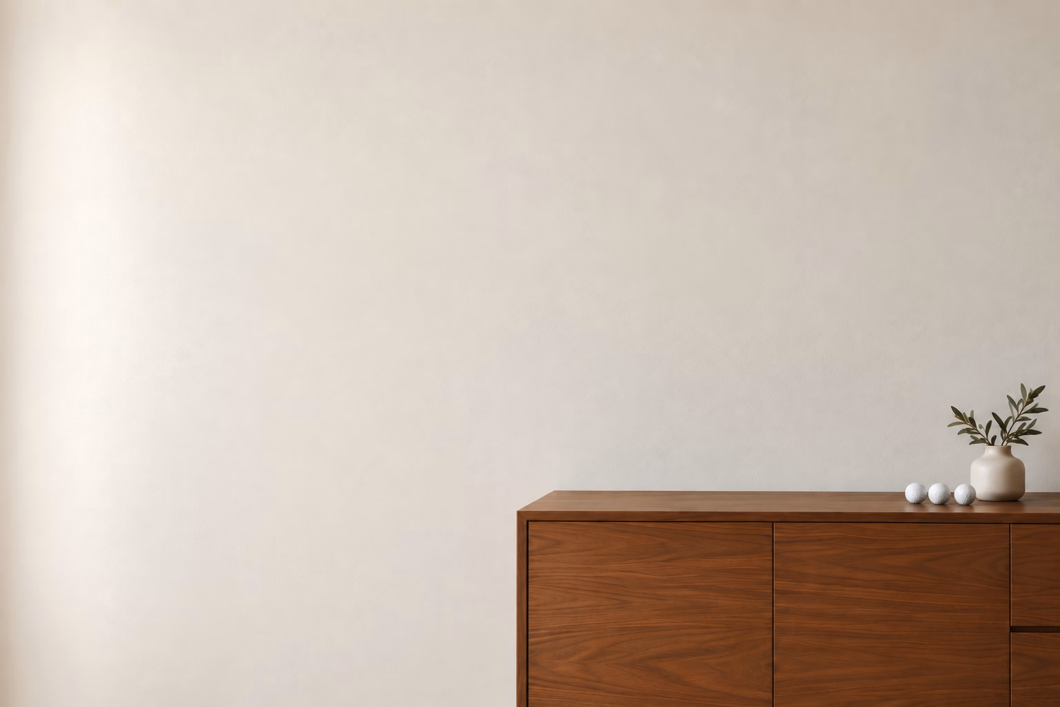 Living room wall above a wooden credenza