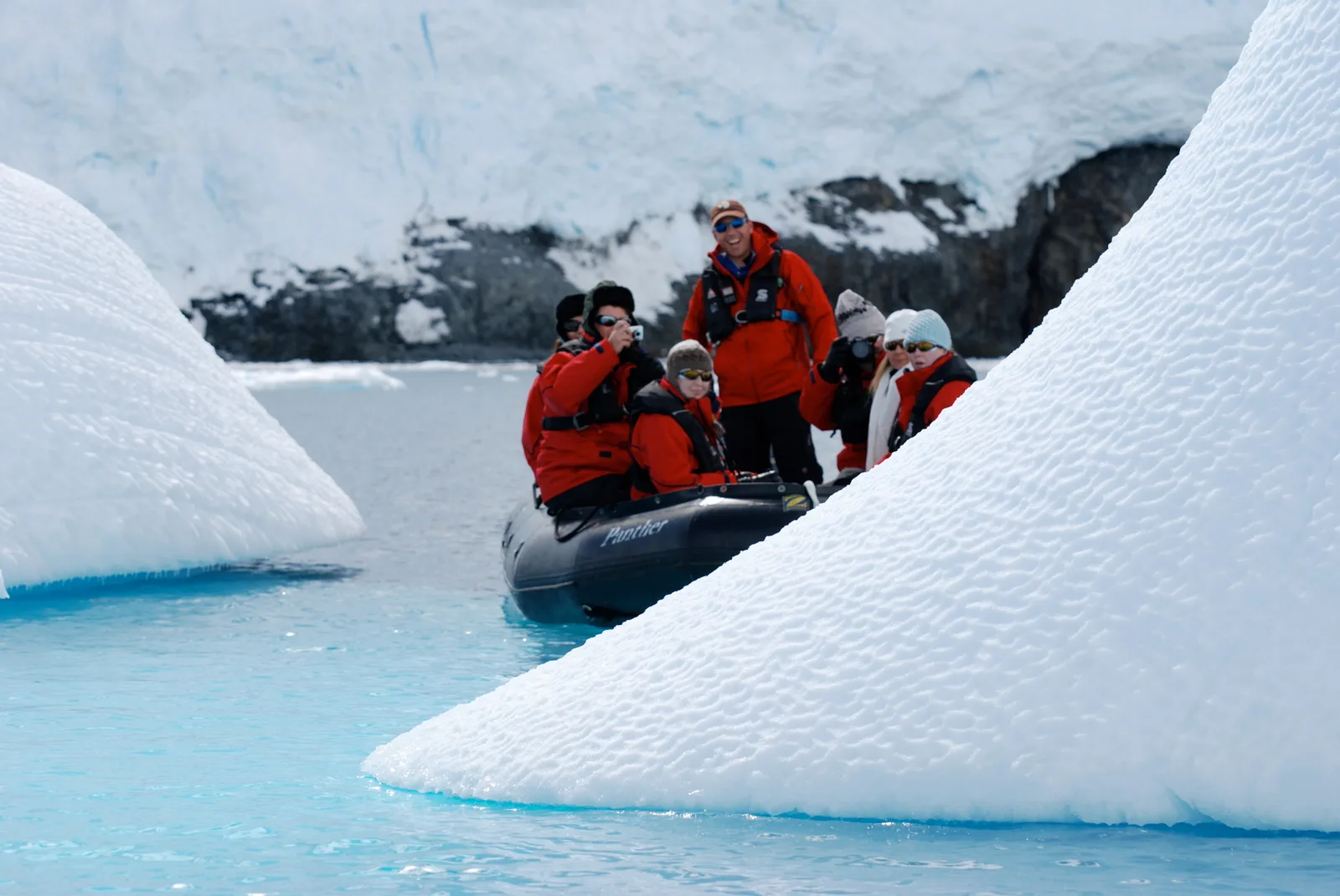 Zodiac tenders exploring close to Antarctic ice