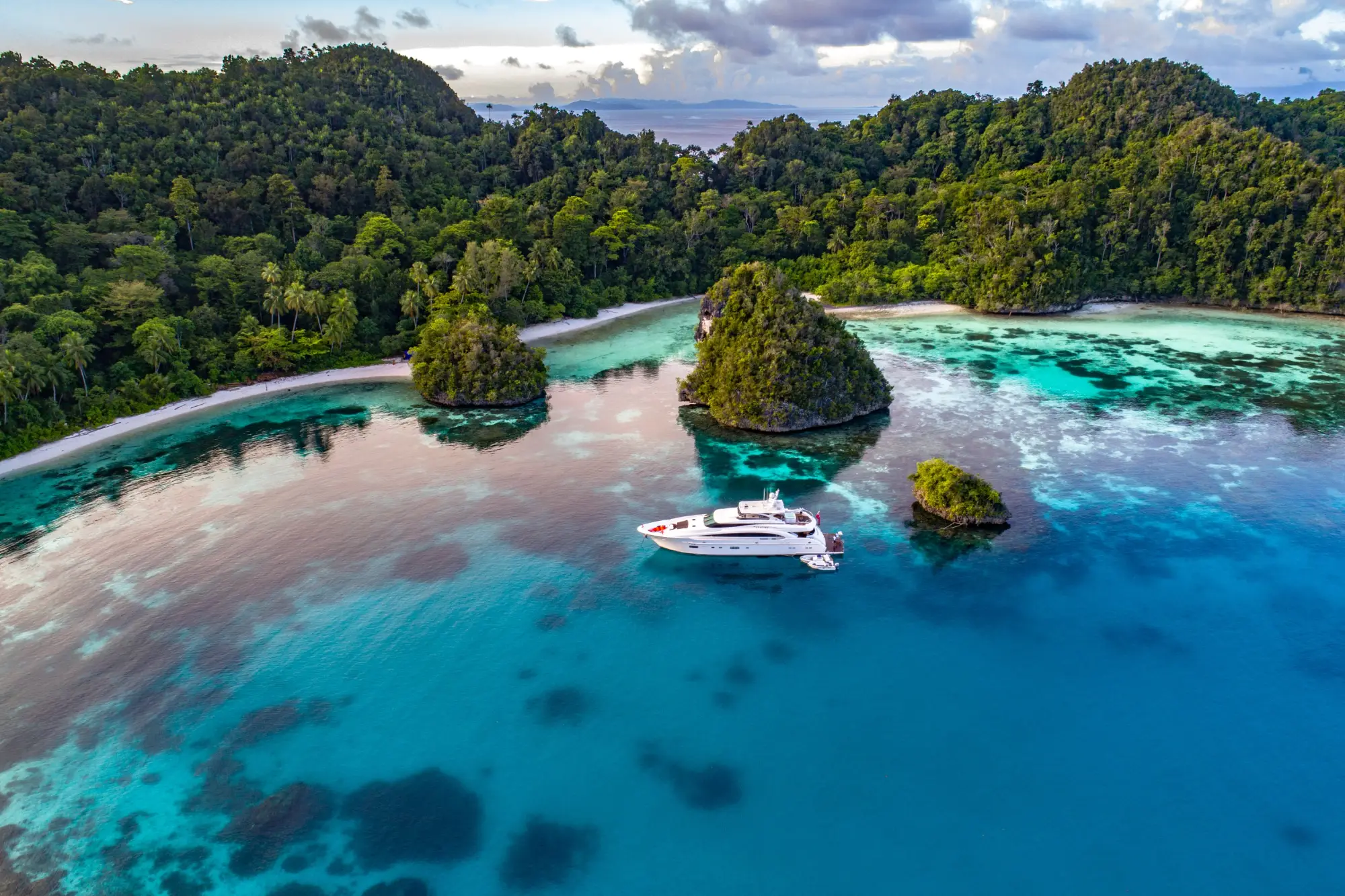Uranie private charter yacht anchored among the islands of Raja Ampat