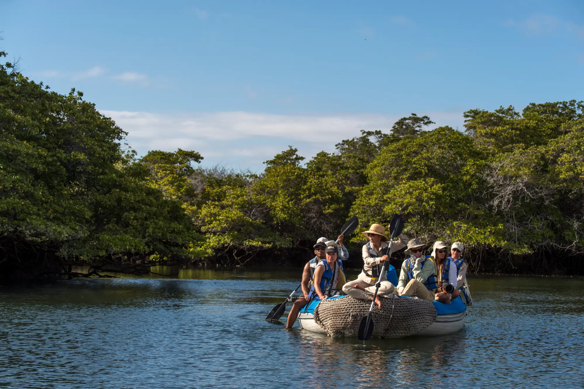 Zodiac ride past volcanic Galápagos scenery
