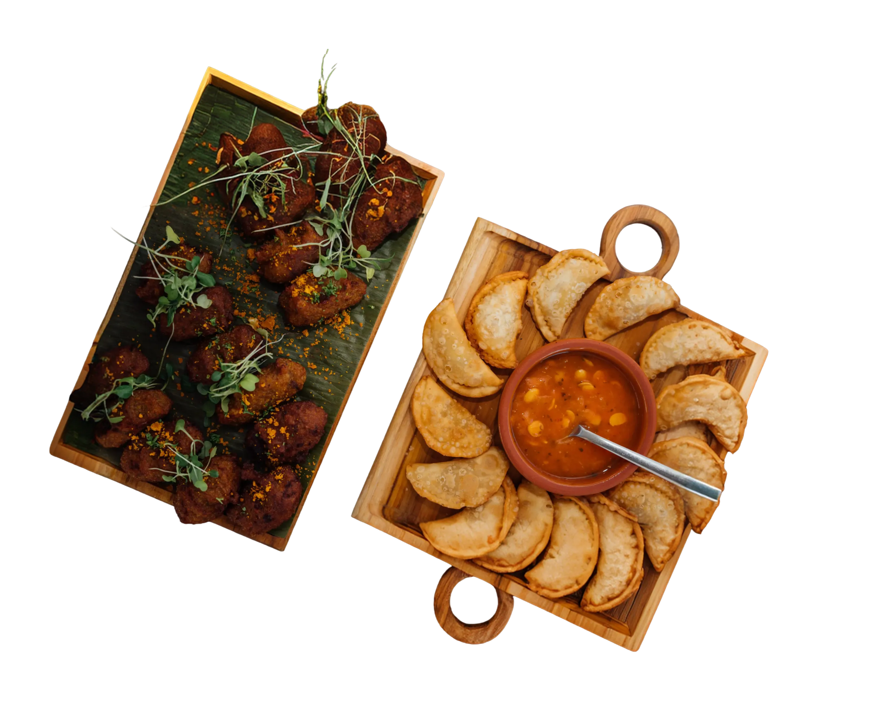 Platters of Ecuadorian snacks and empanadas with dipping sauce