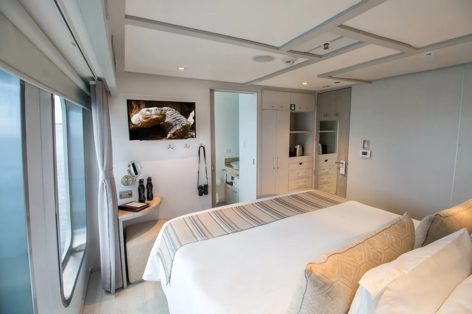 Premium suite bedroom with a double bed