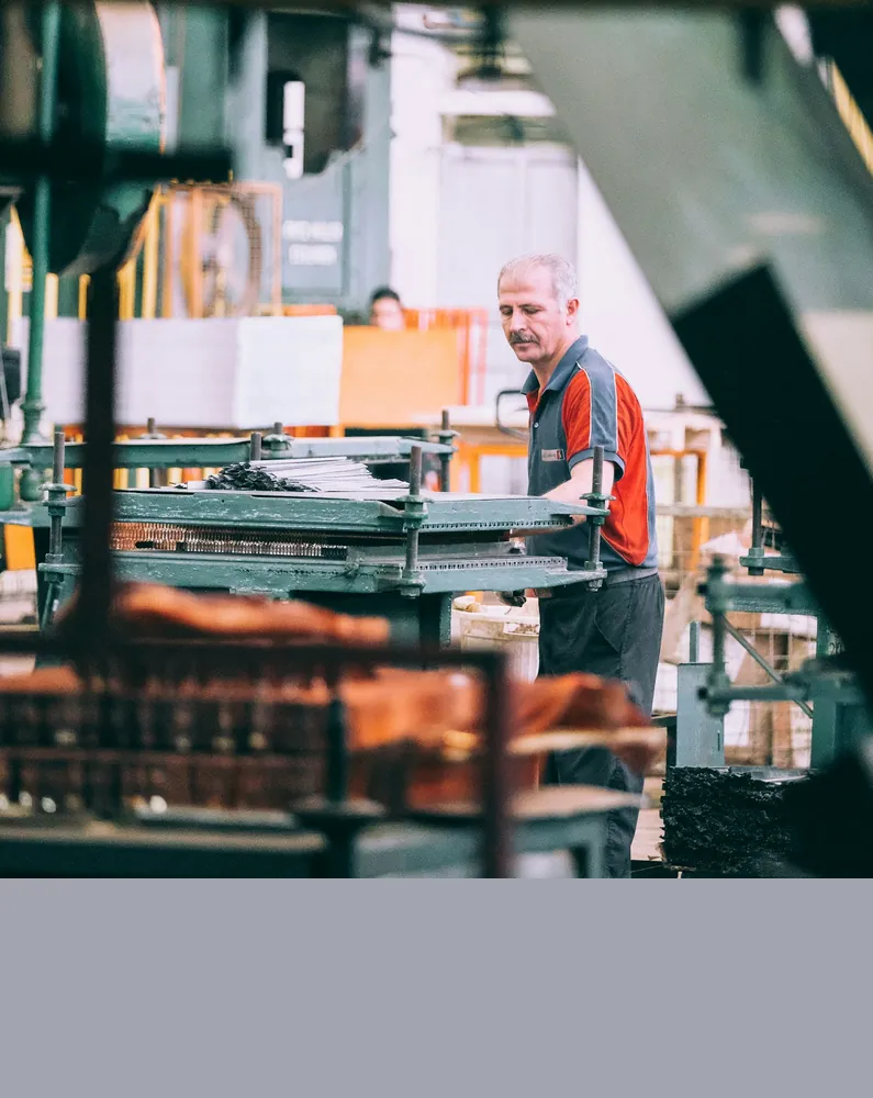 Worker at a factory production line