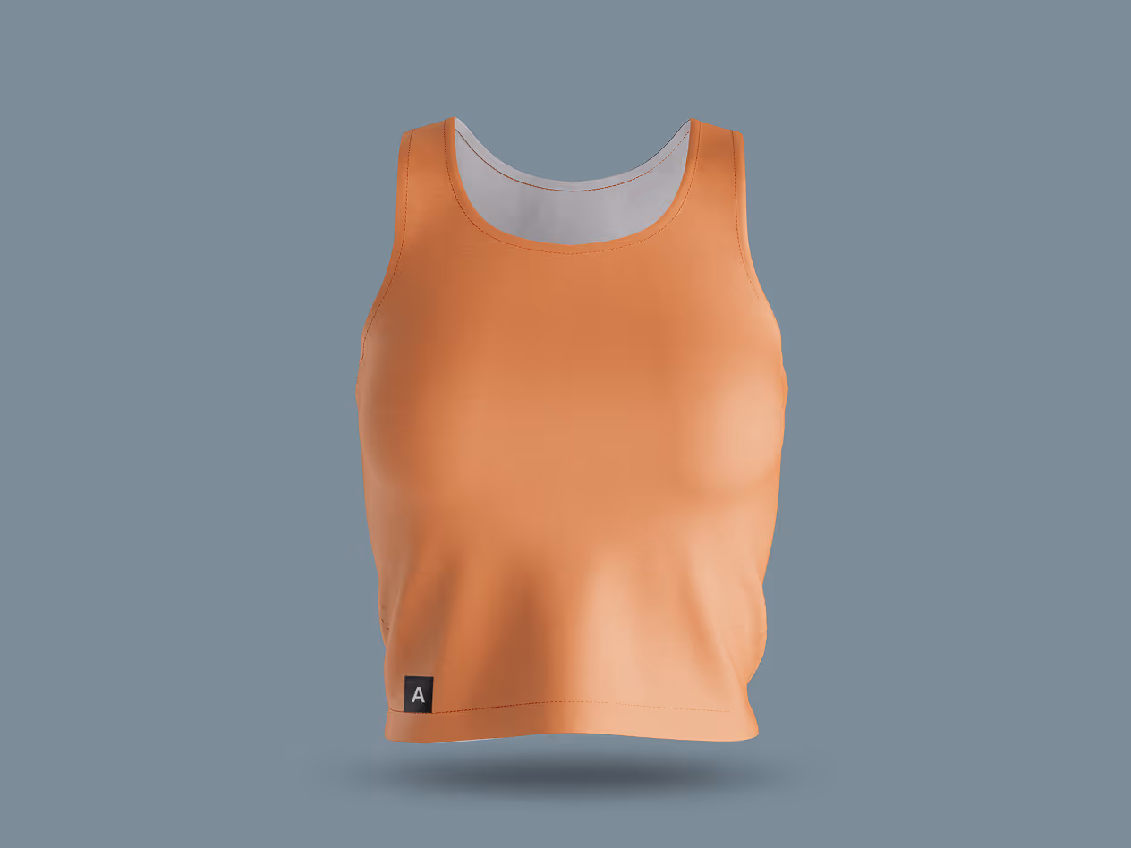 Orange athletic tank top displayed against a blue backdrop, featuring a small black label with the letter “A” near the bottom edge.