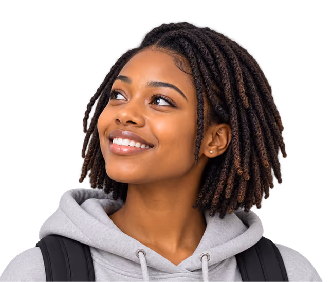 Young woman with short curly hair wearing a light gray hoodie and black backpack, smiling and looking upward to the left.