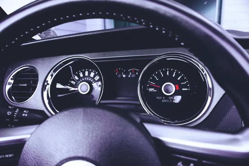man driving car