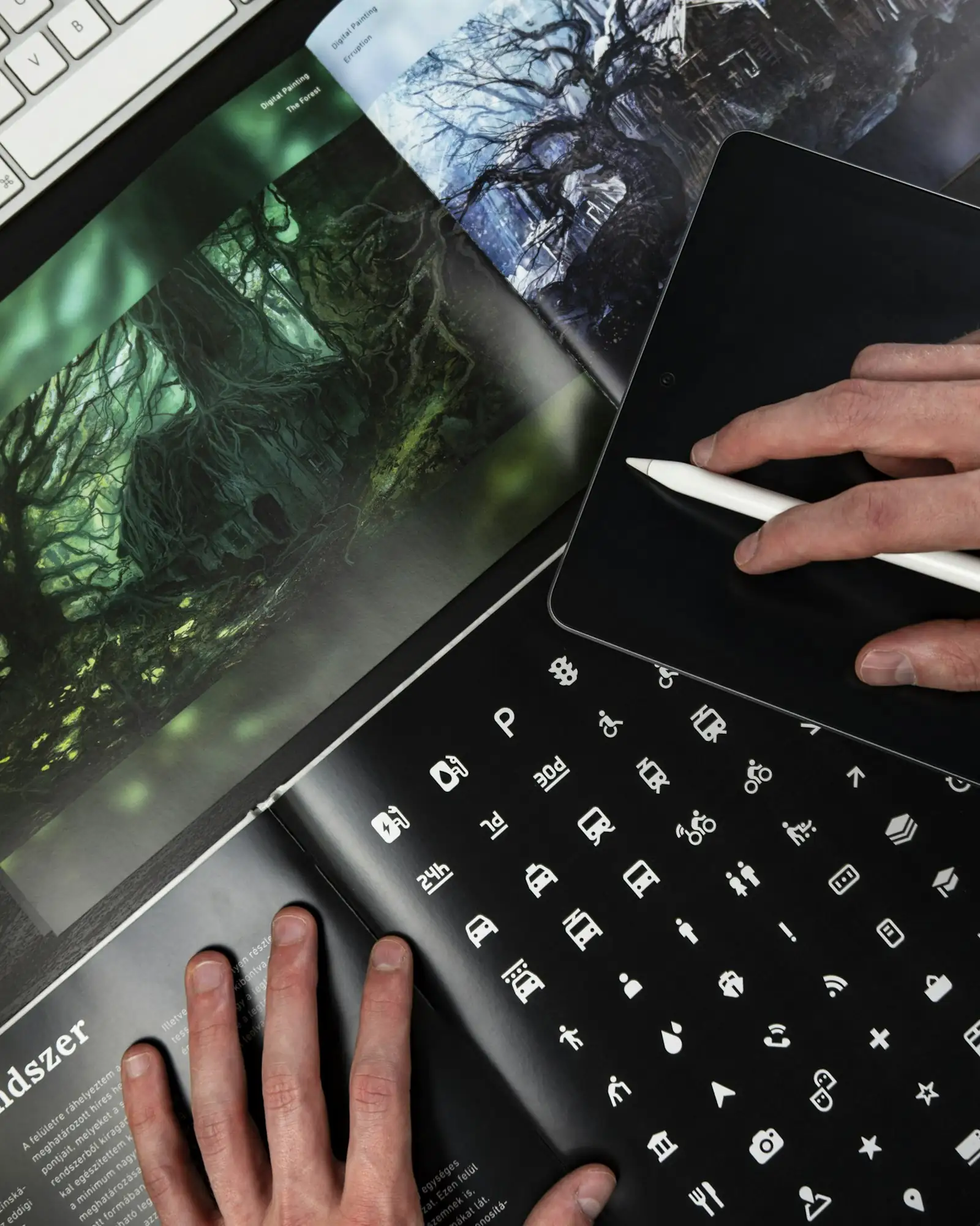 Designer drawing icons on a tablet