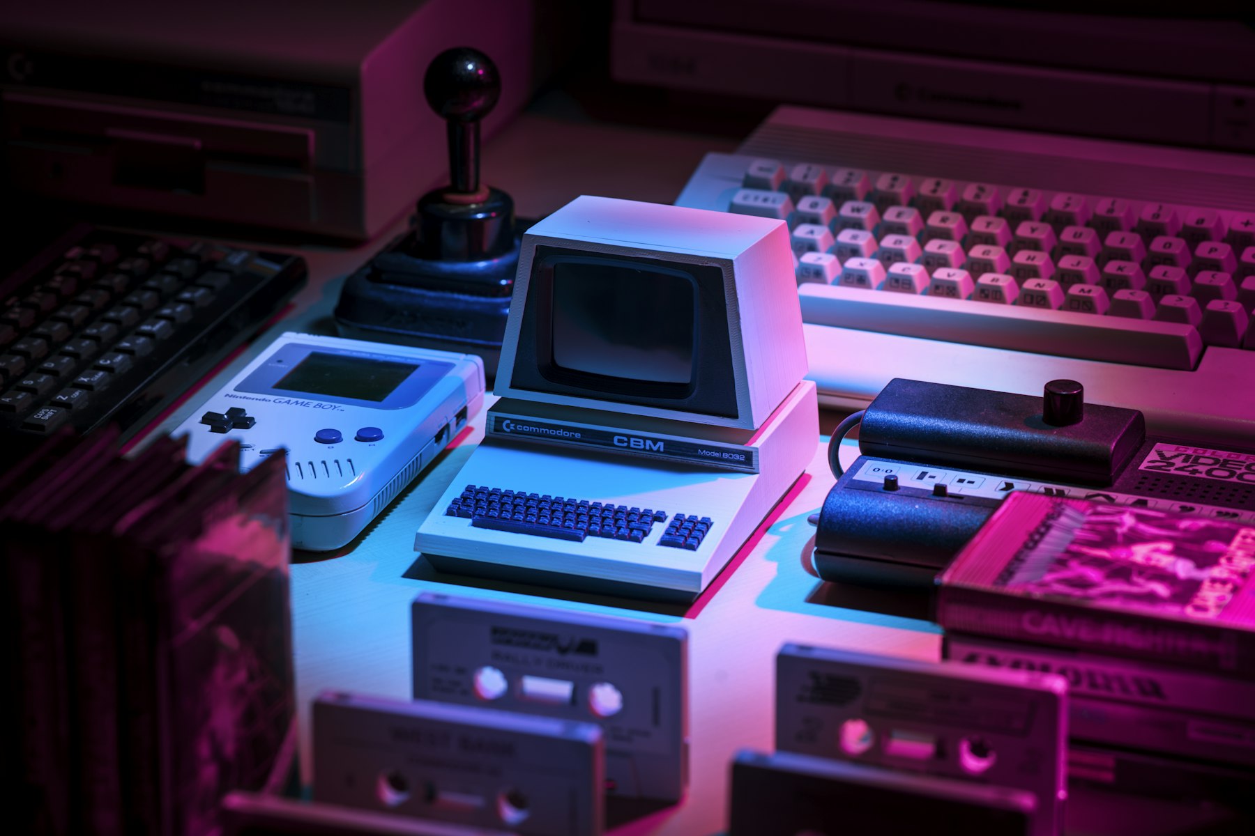 Retro game controller and screens with colourful light