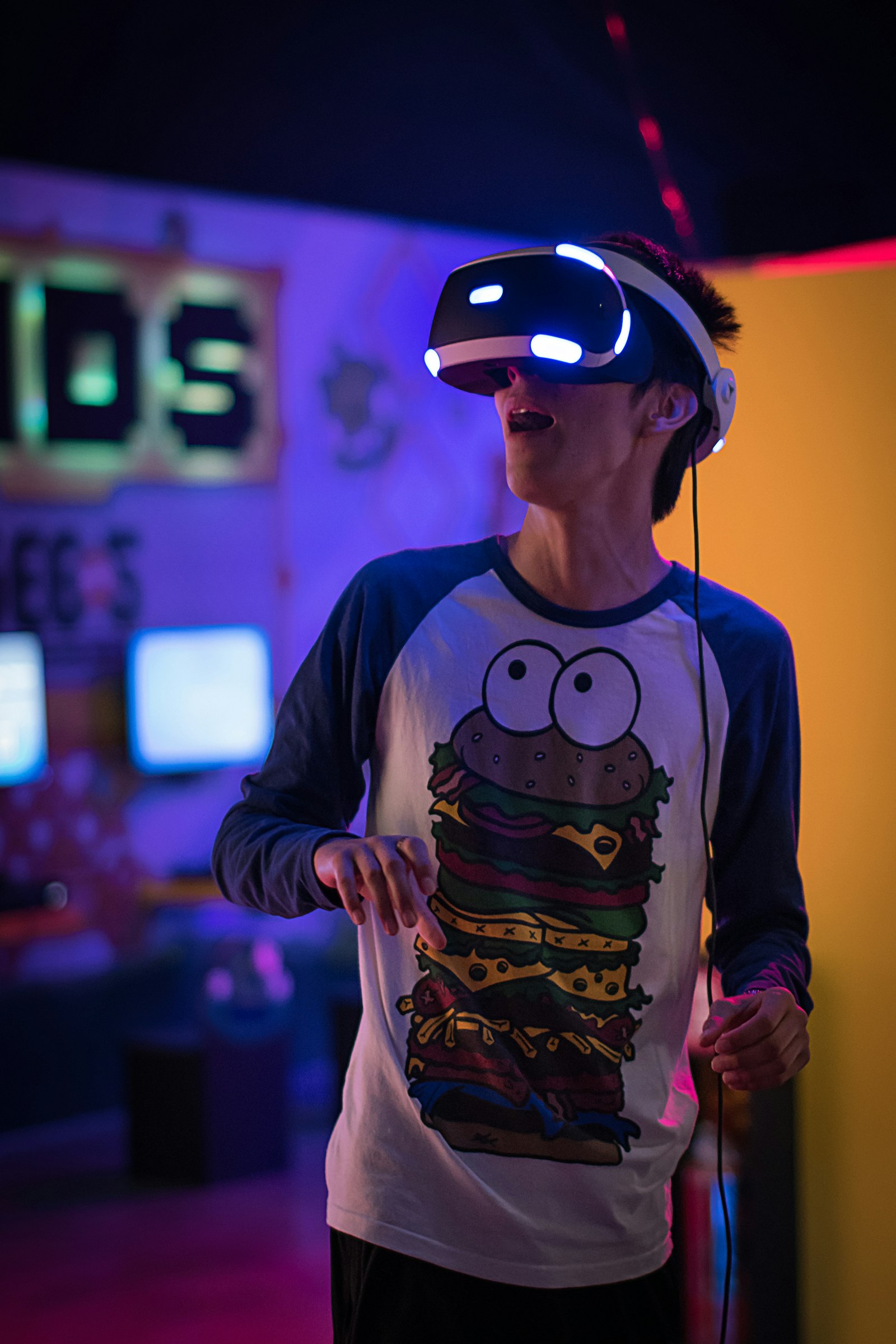 Person wearing a VR headset surrounded by light