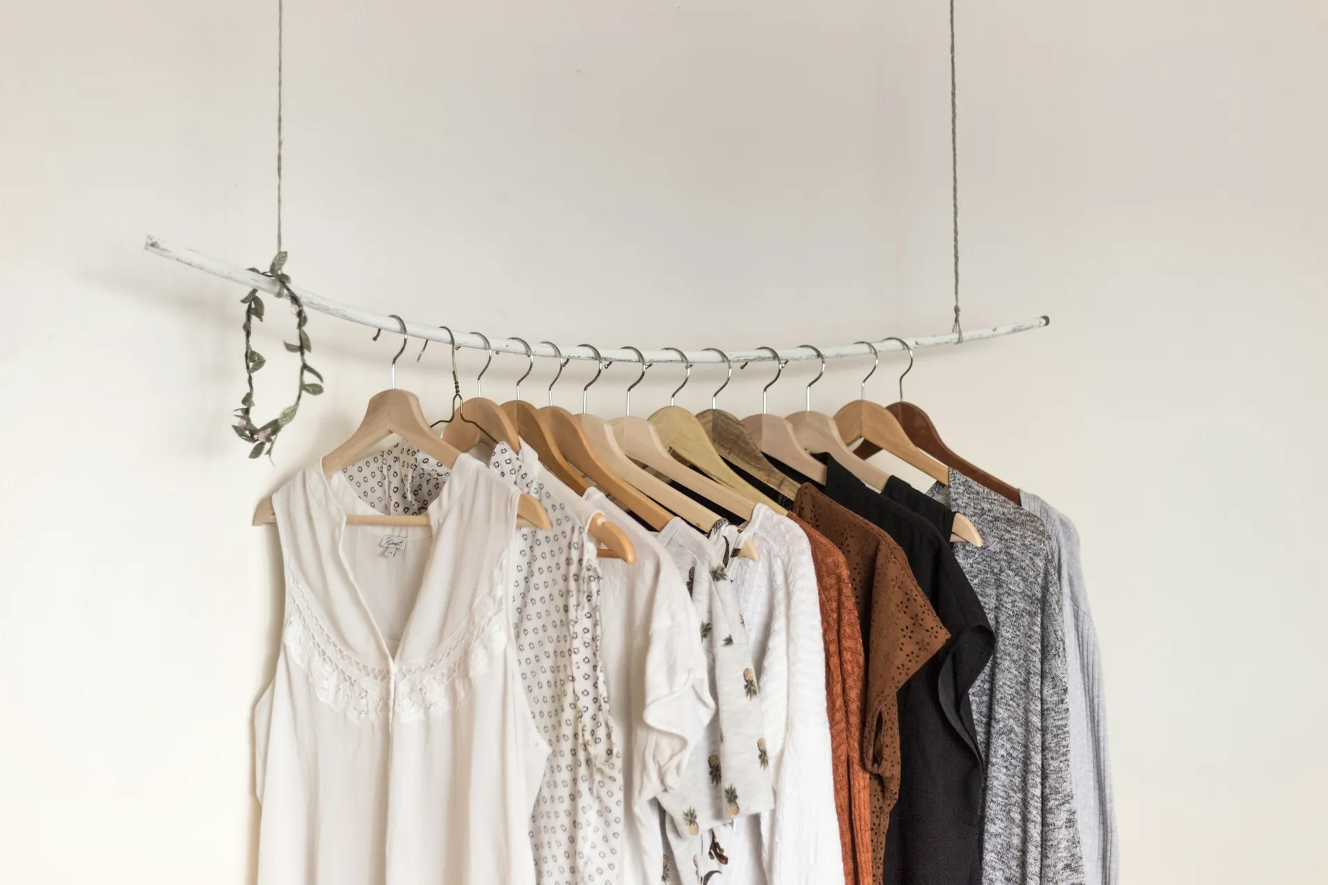White garments hanging on a rail
