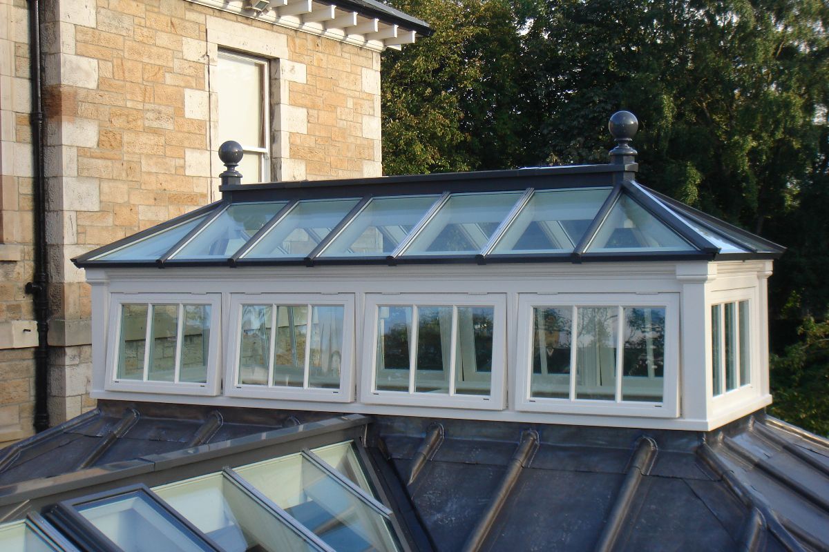 Bespoke rectangular roof lantern with side-frames and corner pilasters