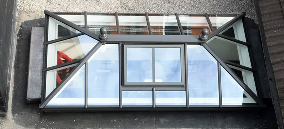 Roof lantern on a flat roof with a pre-installed lead-dressed kerb or upstand