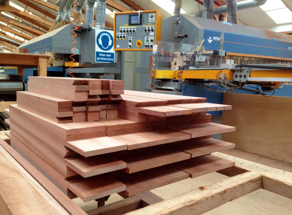Timber being cut and moulded in the mill