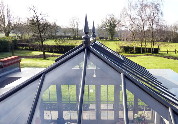 Roof lantern with spire finials overlooking the countryside