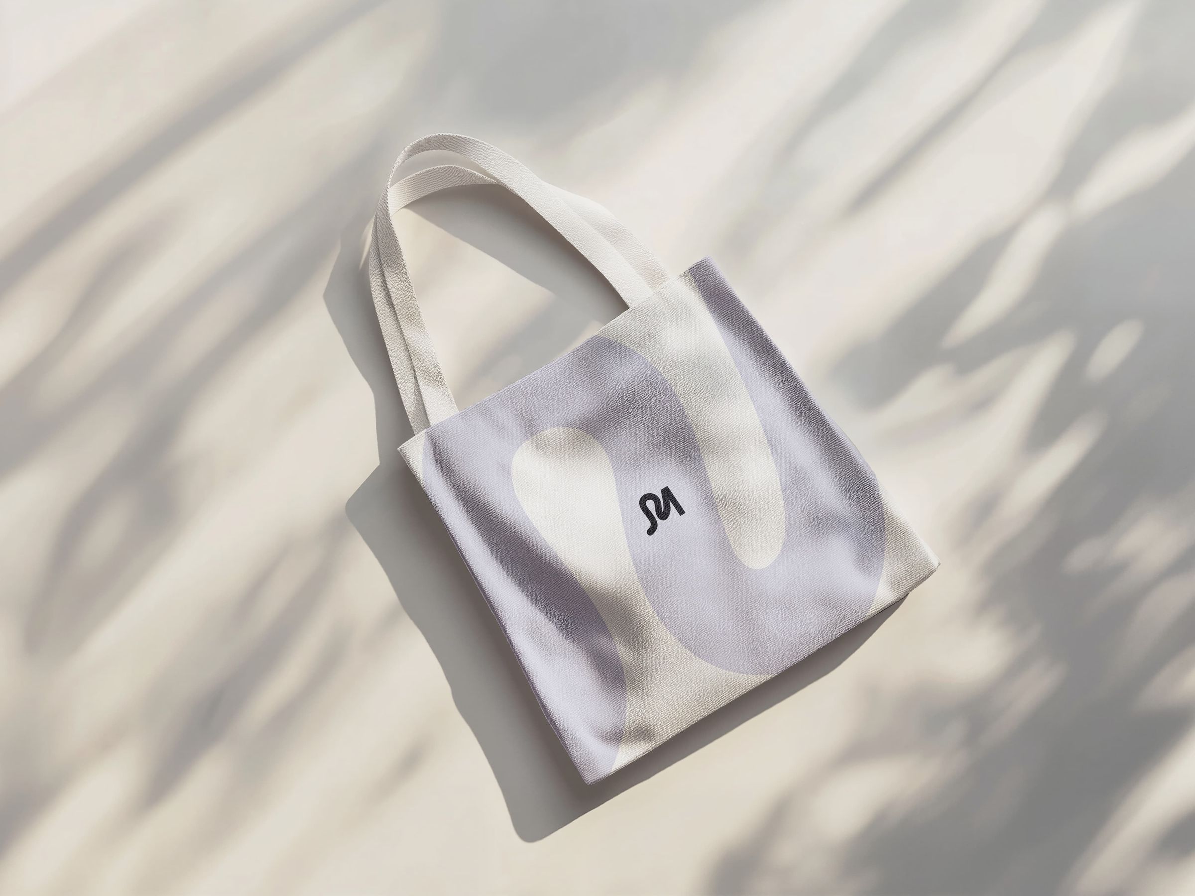 Tote bag met het logo van Manouk Schipper