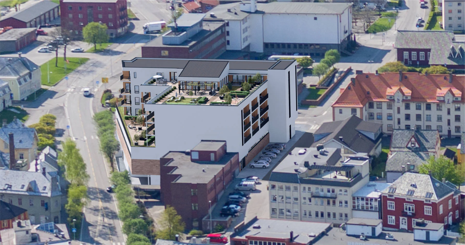 Luftfoto av Domus Gaarden med takhage, terrasser og grønne uterom. Et sentralt boligprosjekt med god plass til fellesskap.