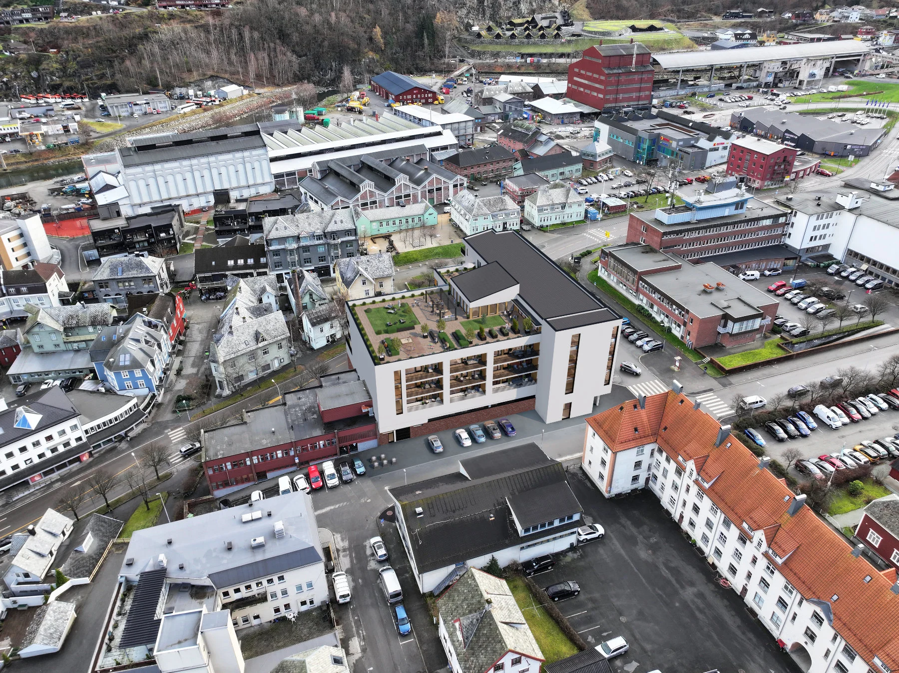 Luftfoto som viser Domus Gaarden og den grønne takhagen midt i sentrum. Alt du trenger i hverdagen ligger rett i nærheten.