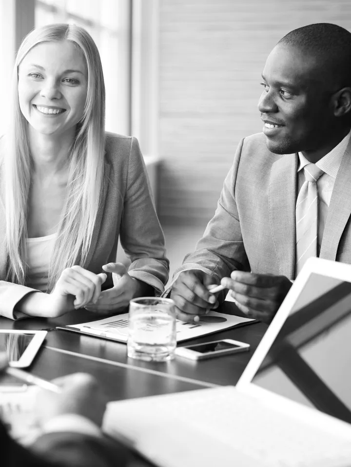 Two professionals participating in a meeting