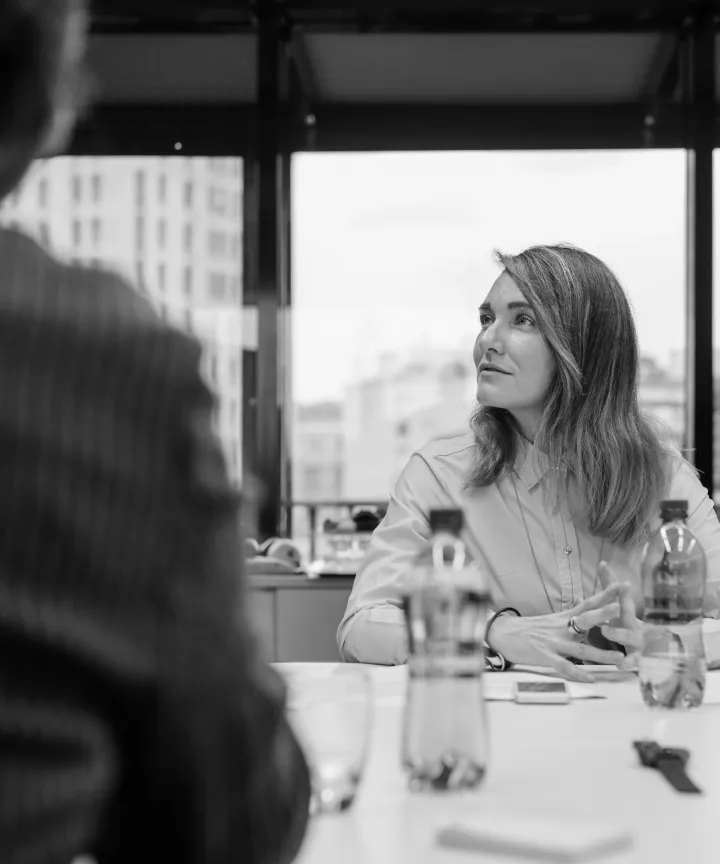Professional woman listening during a conference meeting