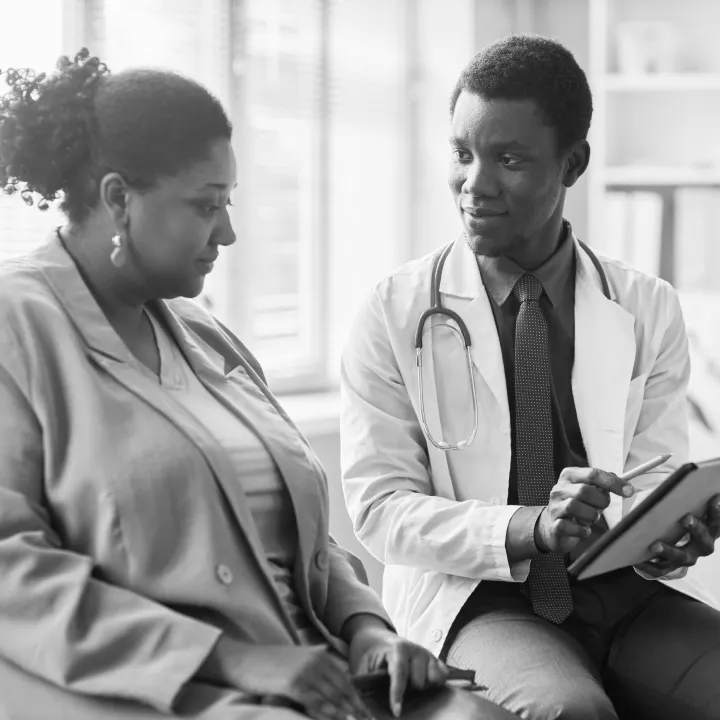 Doctor reviewing information with a patient