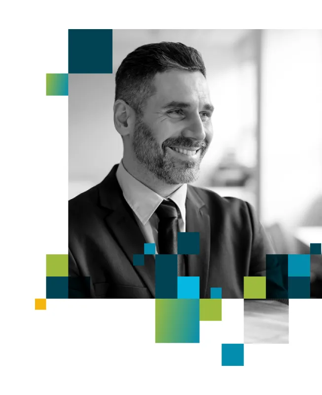Smiling business professional in a suit