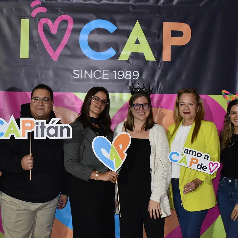 PharmPix team members posing at a CAP community event