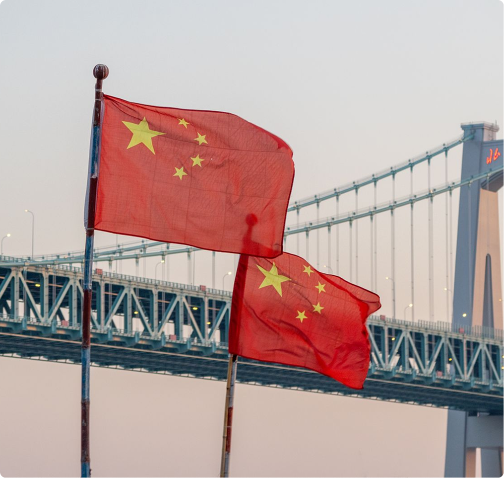 Chinese flags on a bridge