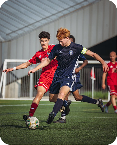 Students playing soccer